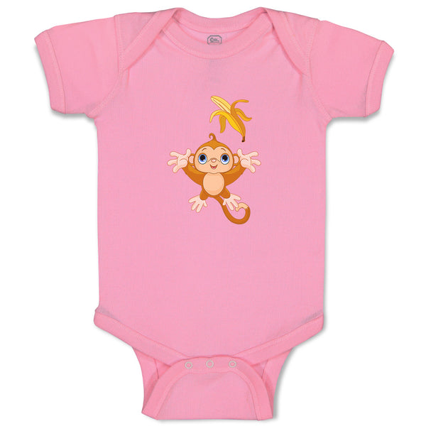 Baby Monkey Throwing Banana up Animals Zoo Funny