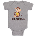 Baby Clothes Go Bananas! An Happy Monkey Sitting and Eating Banana Cotton