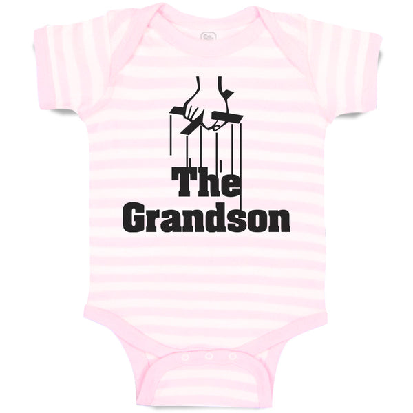 The Grandson Along with Hand Holding Silhouette Cross