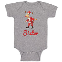 Baby Clothes Sister and A Deer in An Christmas Santa Claus's Costume with Horns