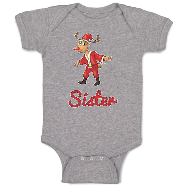 Baby Clothes Sister and A Deer in An Christmas Santa Claus's Costume with Horns
