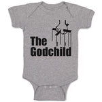 The Godchild with Cross on Hand Holding