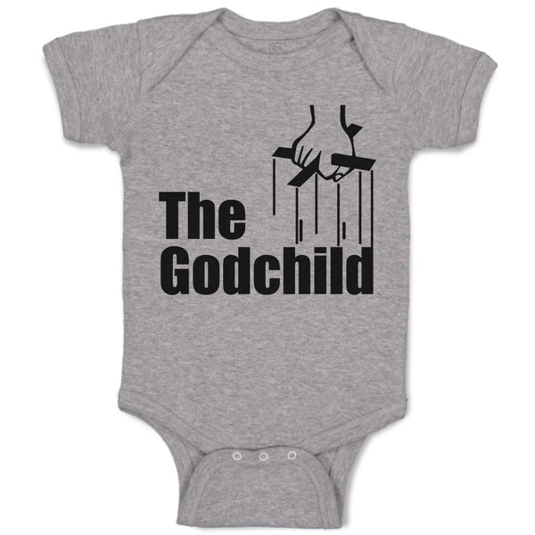 The Godchild with Cross on Hand Holding