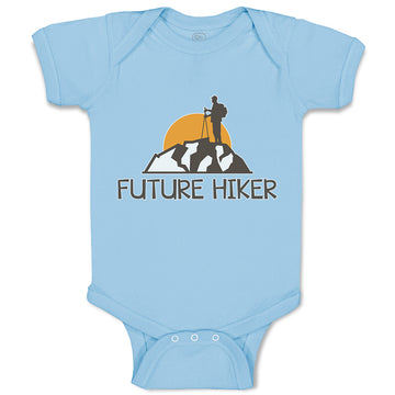 Baby Clothes Future Hiker Tourist Hiking. Man Standing on A Ledge of A Mountain