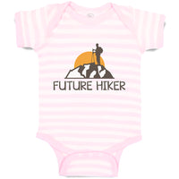Baby Clothes Future Hiker Tourist Hiking. Man Standing on A Ledge of A Mountain