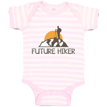 Baby Clothes Future Hiker Tourist Hiking. Man Standing on A Ledge of A Mountain