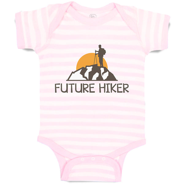 Baby Clothes Future Hiker Tourist Hiking. Man Standing on A Ledge of A Mountain