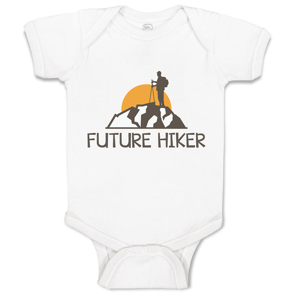 Baby Clothes Future Hiker Tourist Hiking. Man Standing on A Ledge of A Mountain