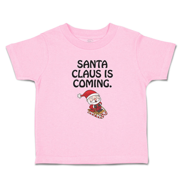Toddler Clothes Santa Claus Is Coming with Snow Riding Stick Toddler Shirt